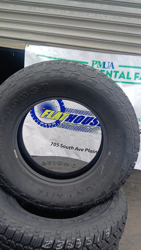 Set of 4 Firestone Used Tires         SIZE: 235 75 17
